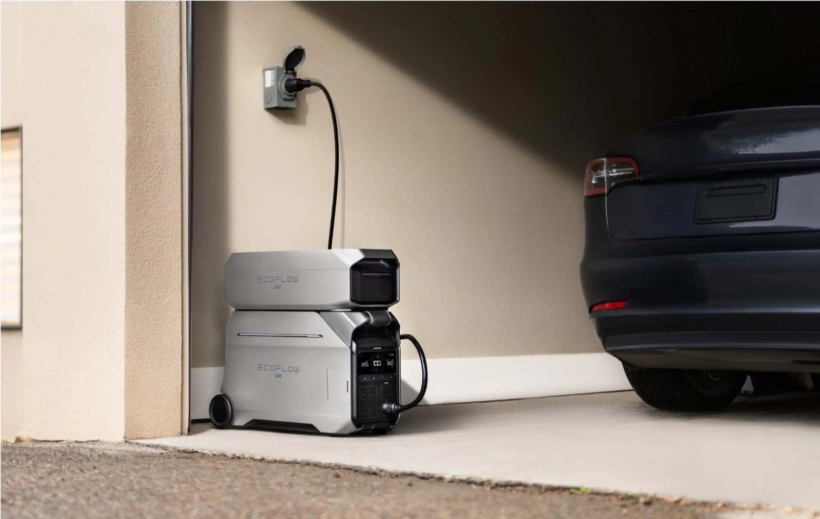 Power station charging in a garage next to an electric car