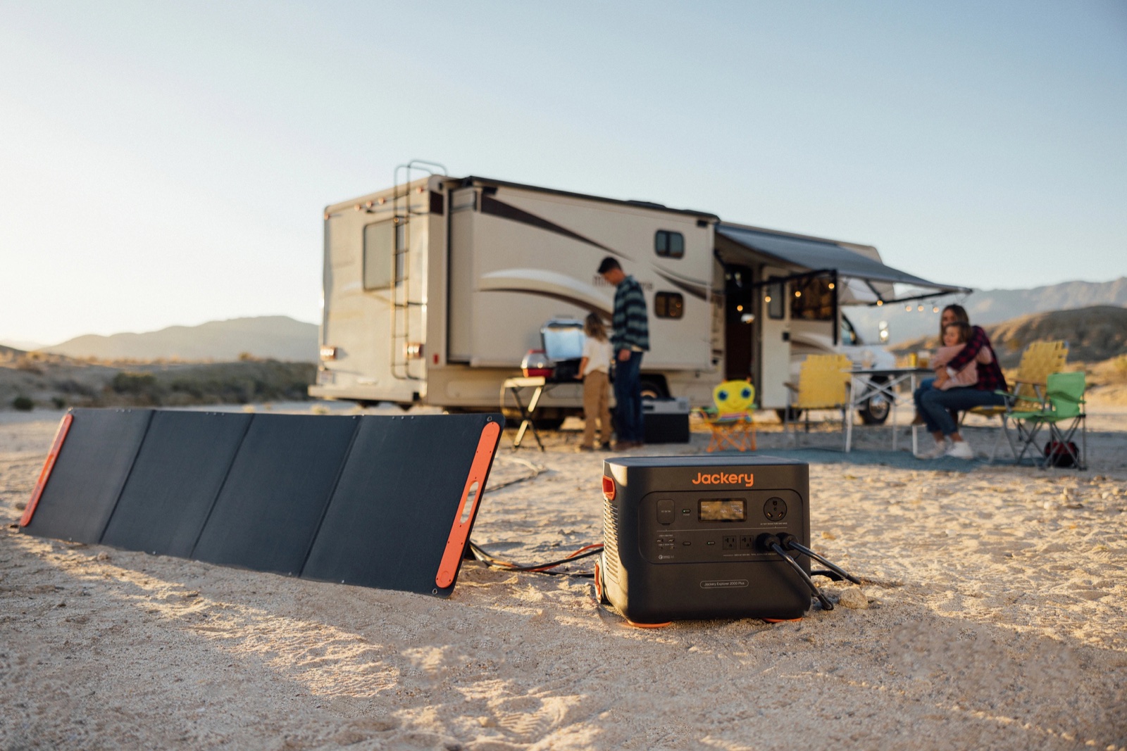 Solar panel and power station outside a motorhome in the desert